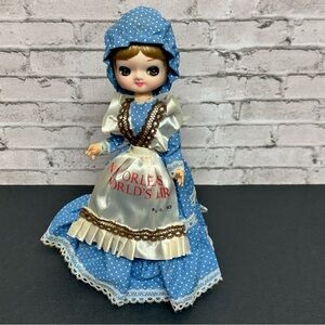 Vintage 1983 New Orleans World's Fair Big Eyes Doll Dress Bonnet Stand 10 in.